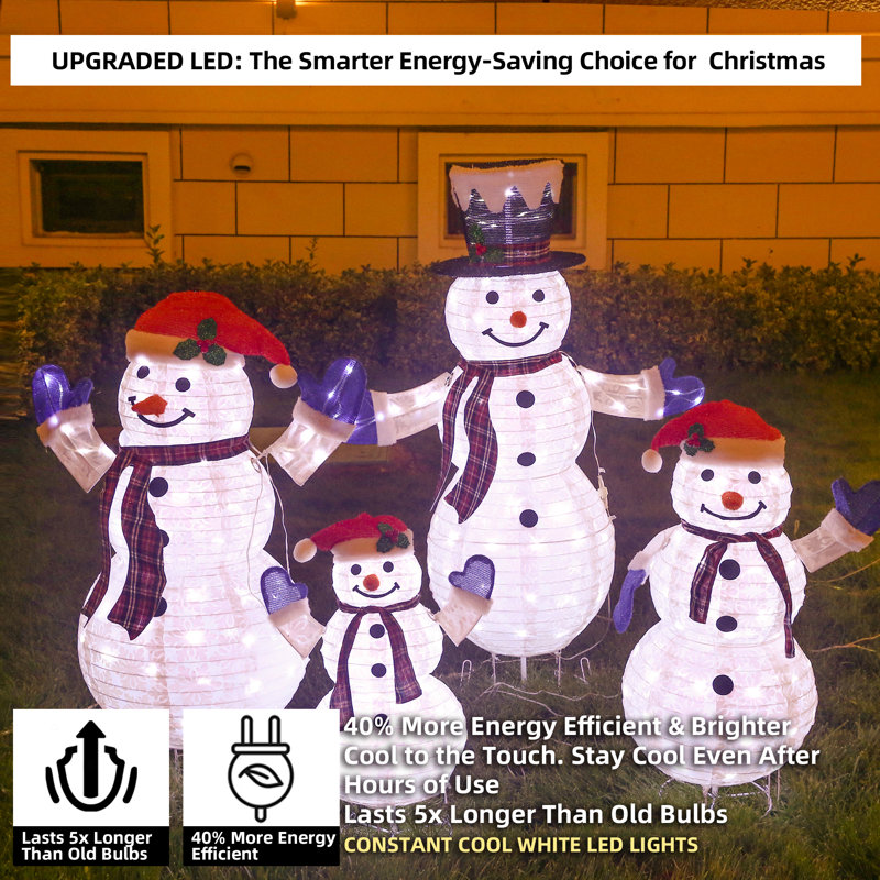 The Holiday Aisle® Hutto 4 Piece 3D Lighted Snowman Family Outdoor